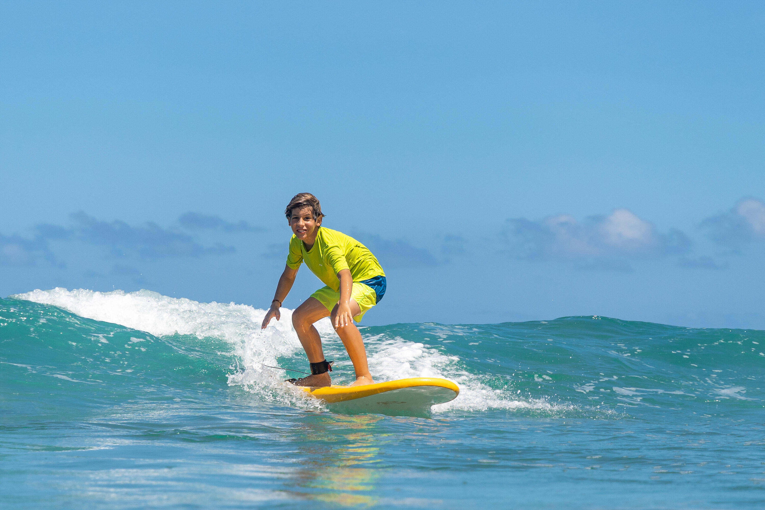 Costume mare surf ragazzo 100 SHIBA blu-giallo 10/10