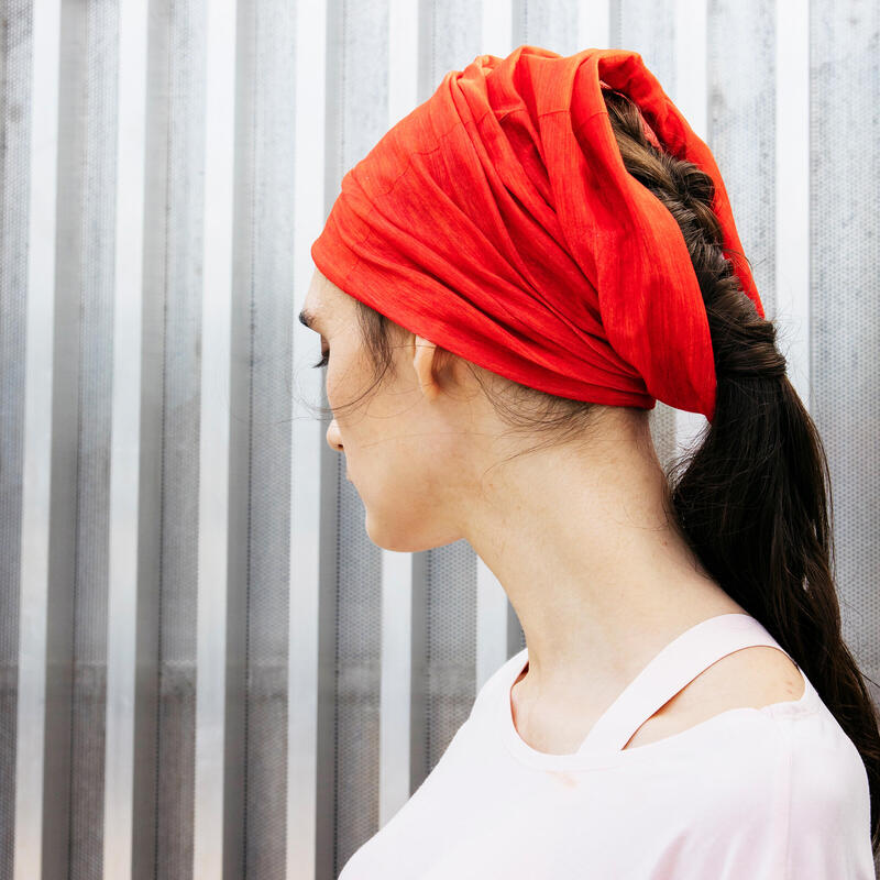 KIPRUN Unisex running neck warmer/multi-pupose headband - orange spice