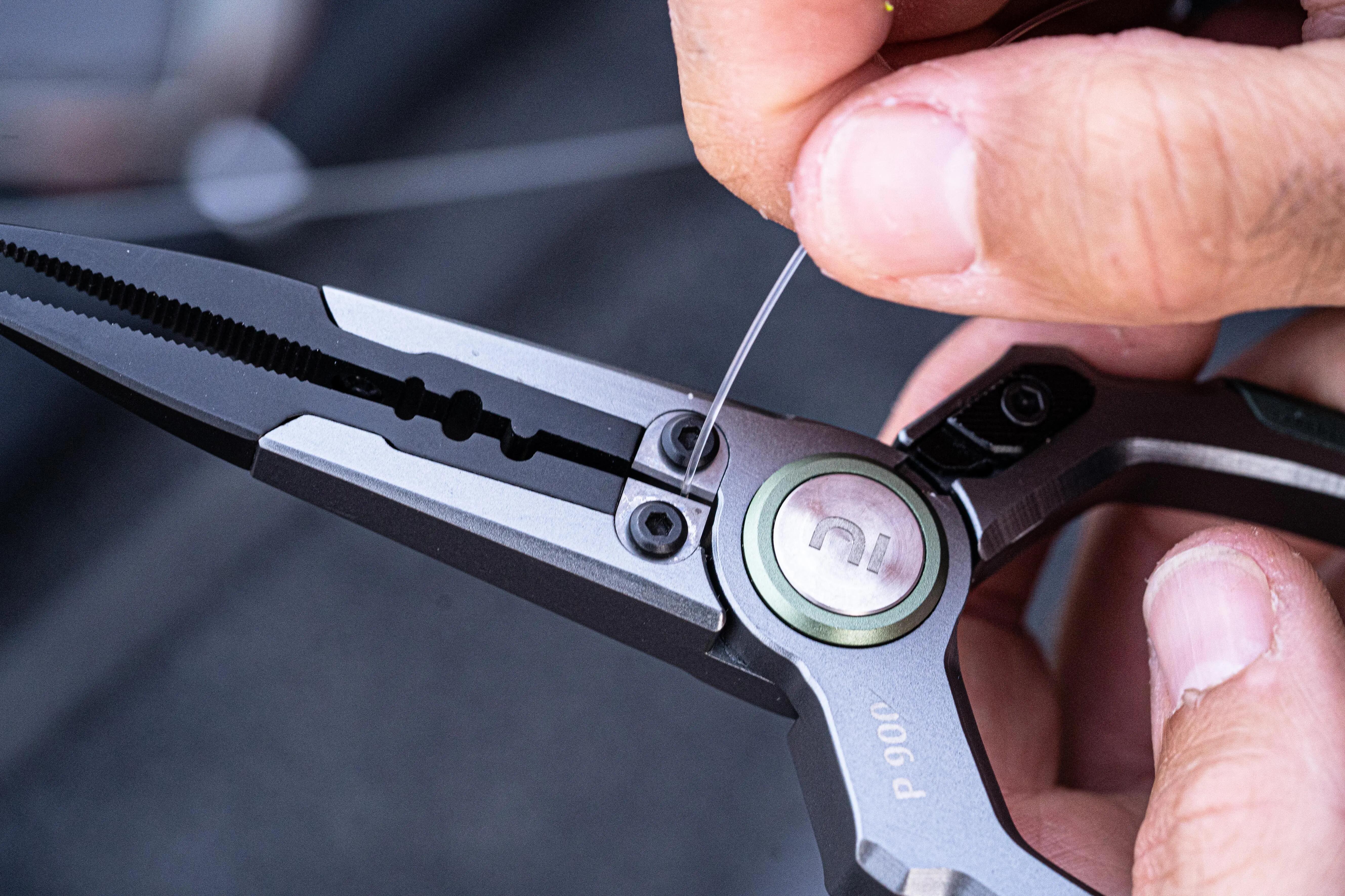 Fishing pliers crimping fishing line