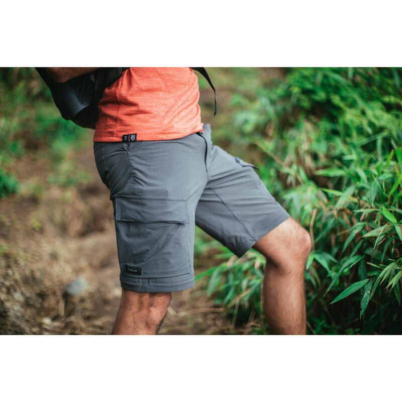 Pantalon desmontable montaña y trekking Hombre Travel 500 gris