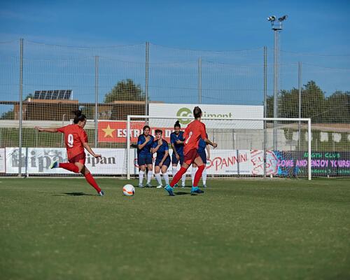 women team playing football