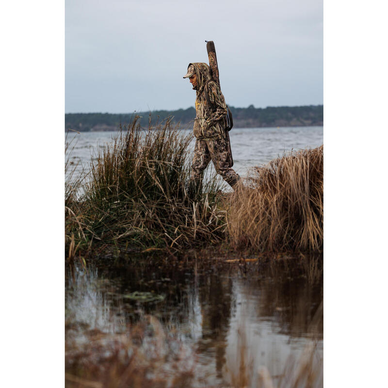 100 warm and waterproof hunting trousers with wetlands camouflage