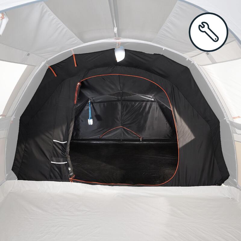 Changement de la chambre d'une tente à structure rigide.