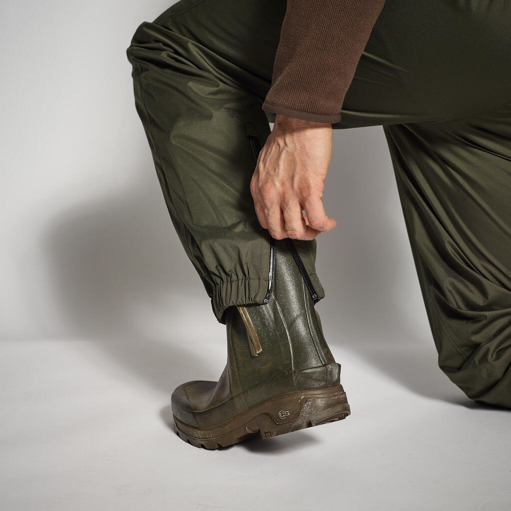 Poľovnícke nohavice proti dažďu 100 ľahké a nepremokavé zelené