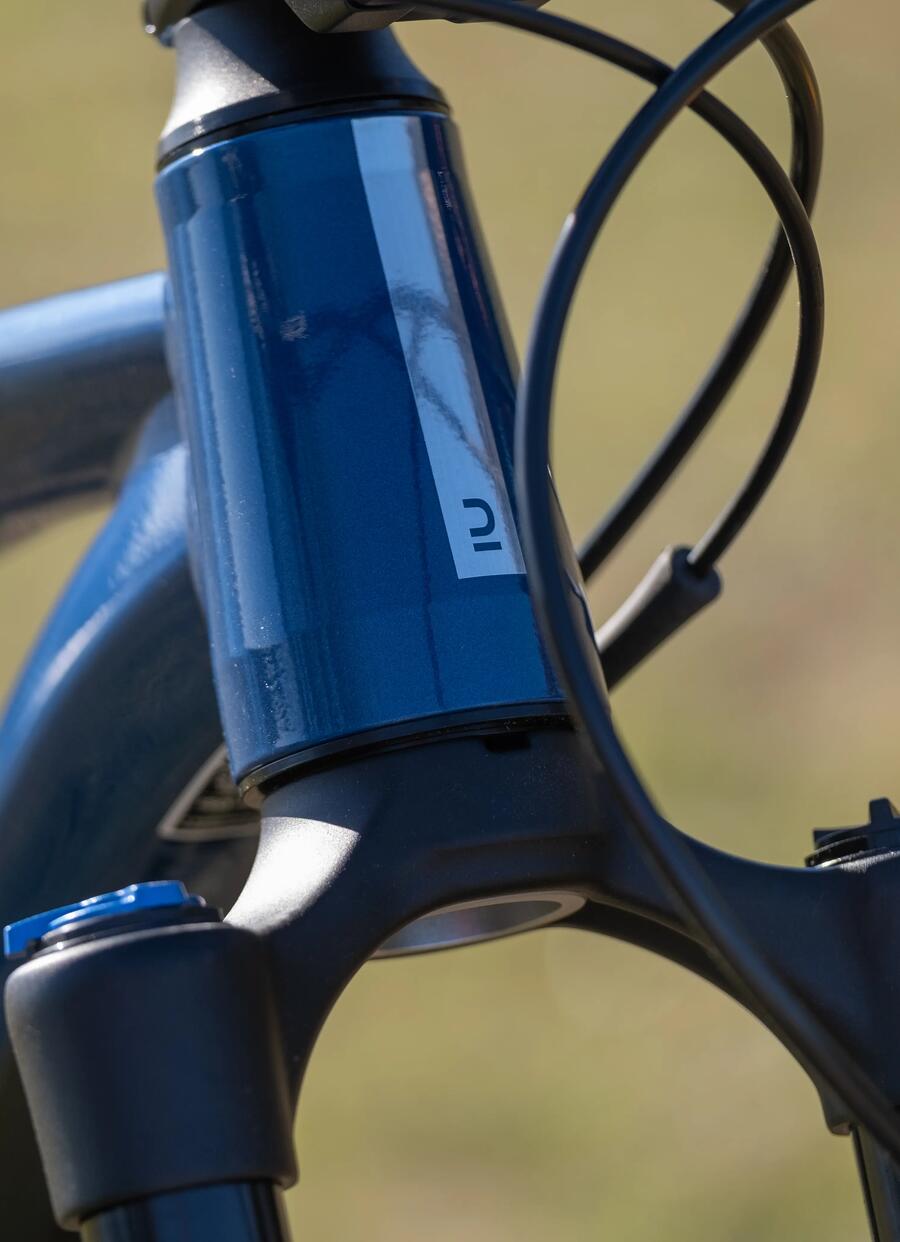 BICICLETA DE MONTAÑA ROCKRIDER ST 900 GRIS/NARANJA