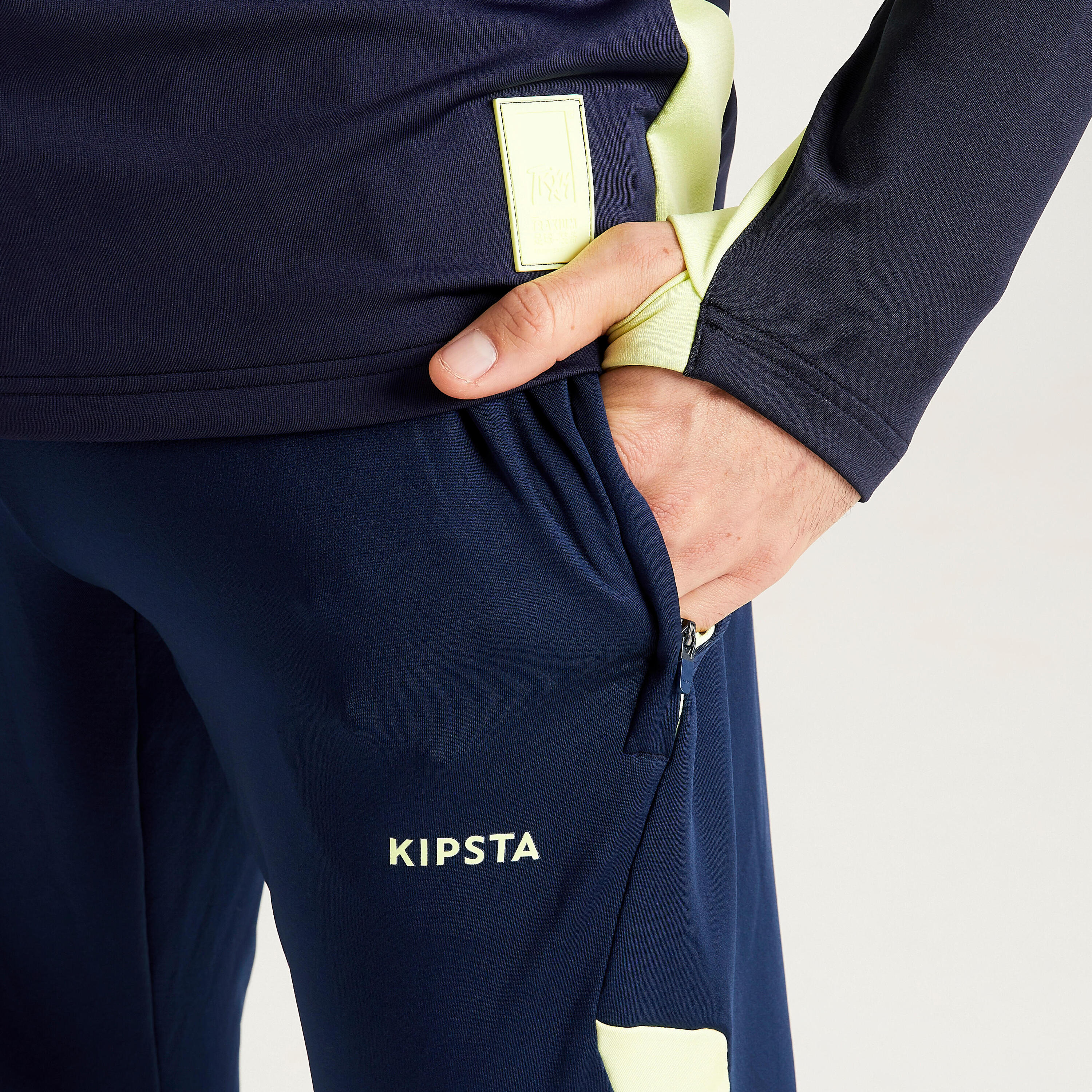 Pantalón de fútbol adulto TRAXIUM marino y amarillo 3/9