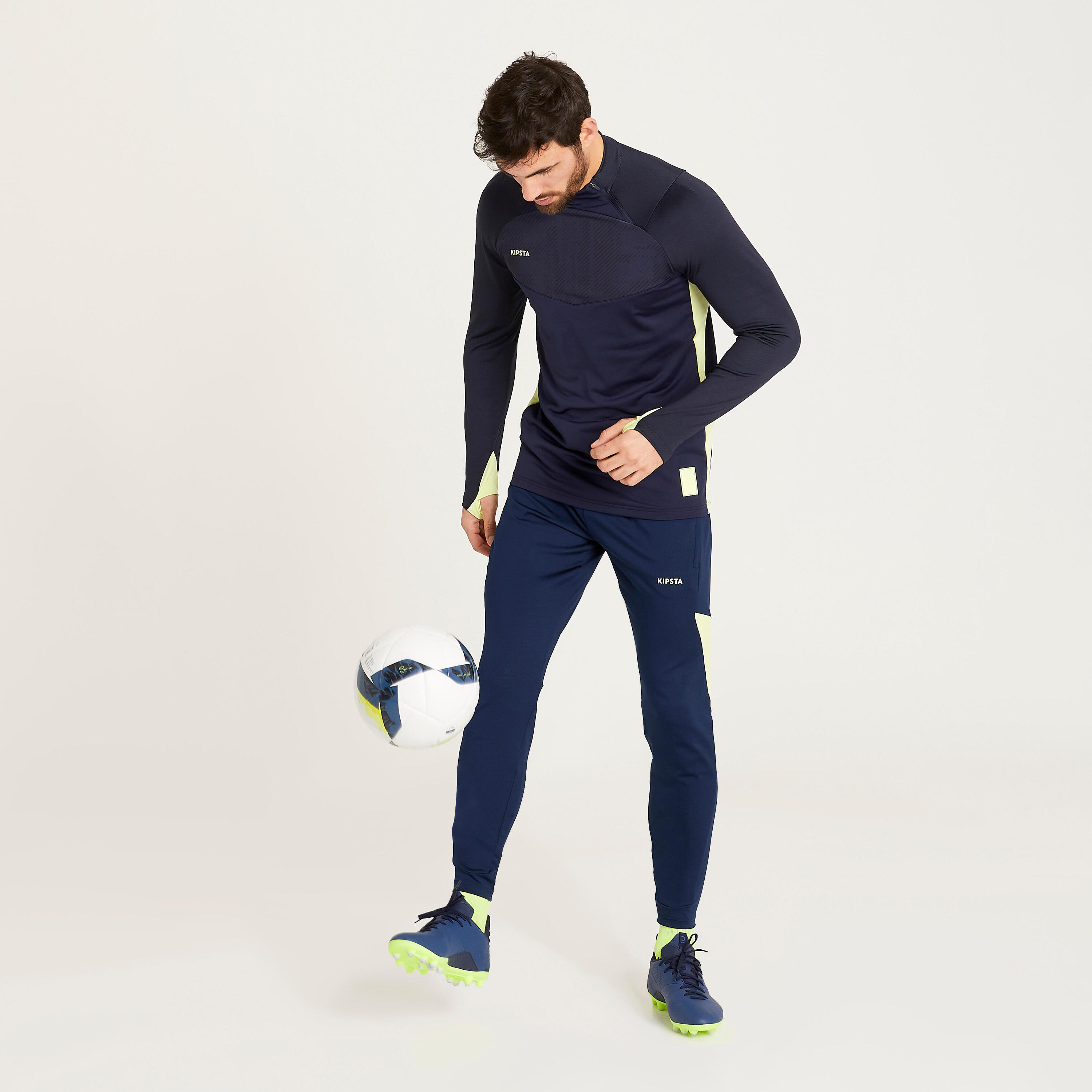 KIPSTA Pantalón de fútbol adulto TRAXIUM marino y amarillo