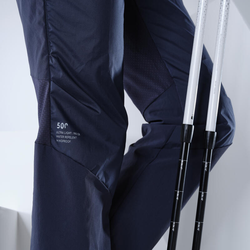 Dámské turistické kalhoty FH 500 ultra lehké modré
