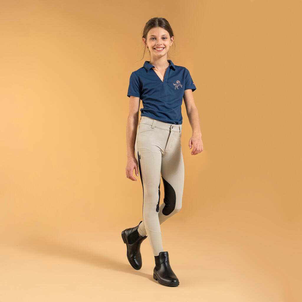 Bērnu jāšanas bikses ar tīkliņaudumu “500”, oranžas, tumši zilas