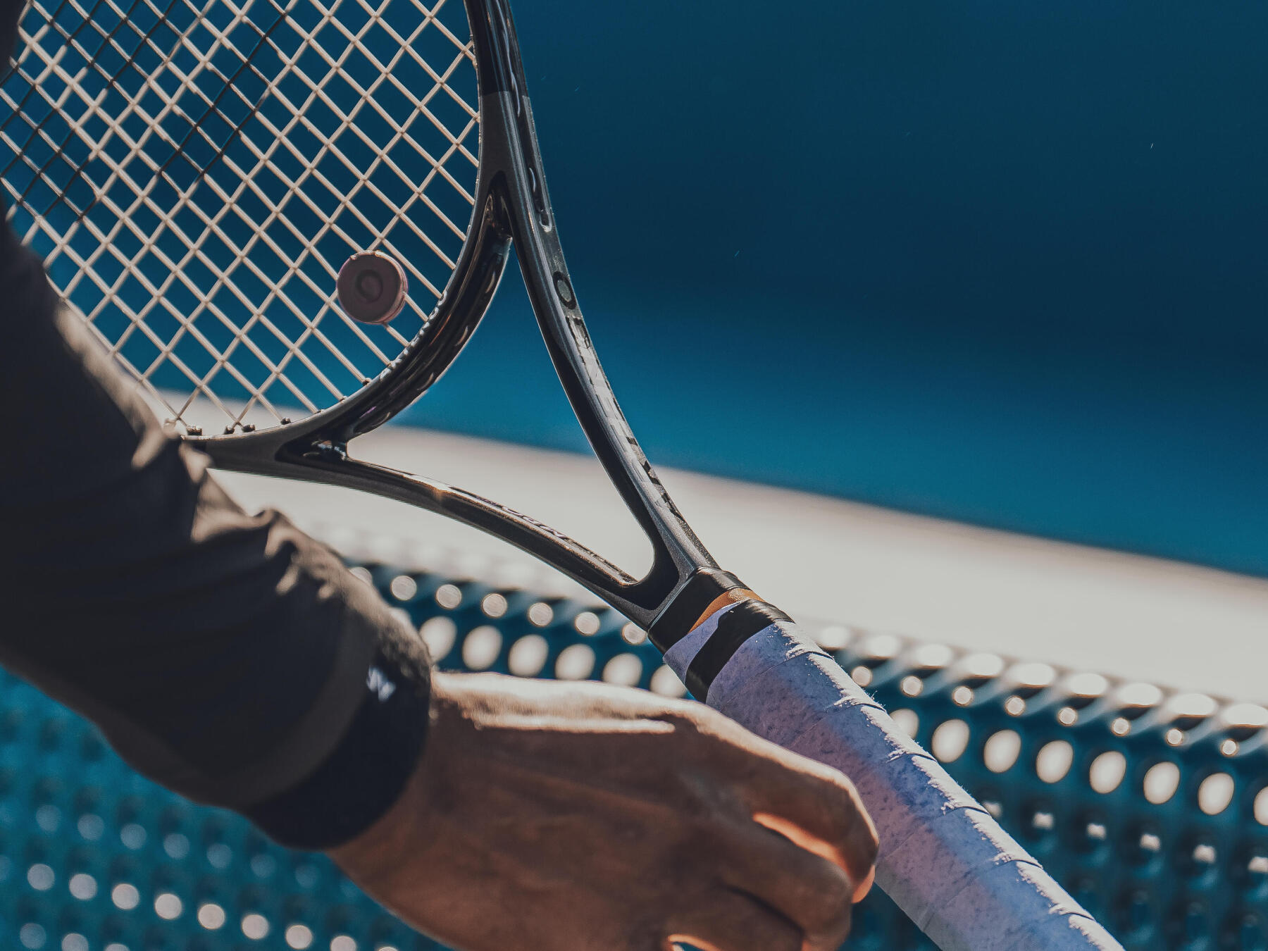 What is the correct string tension for a tennis racket?