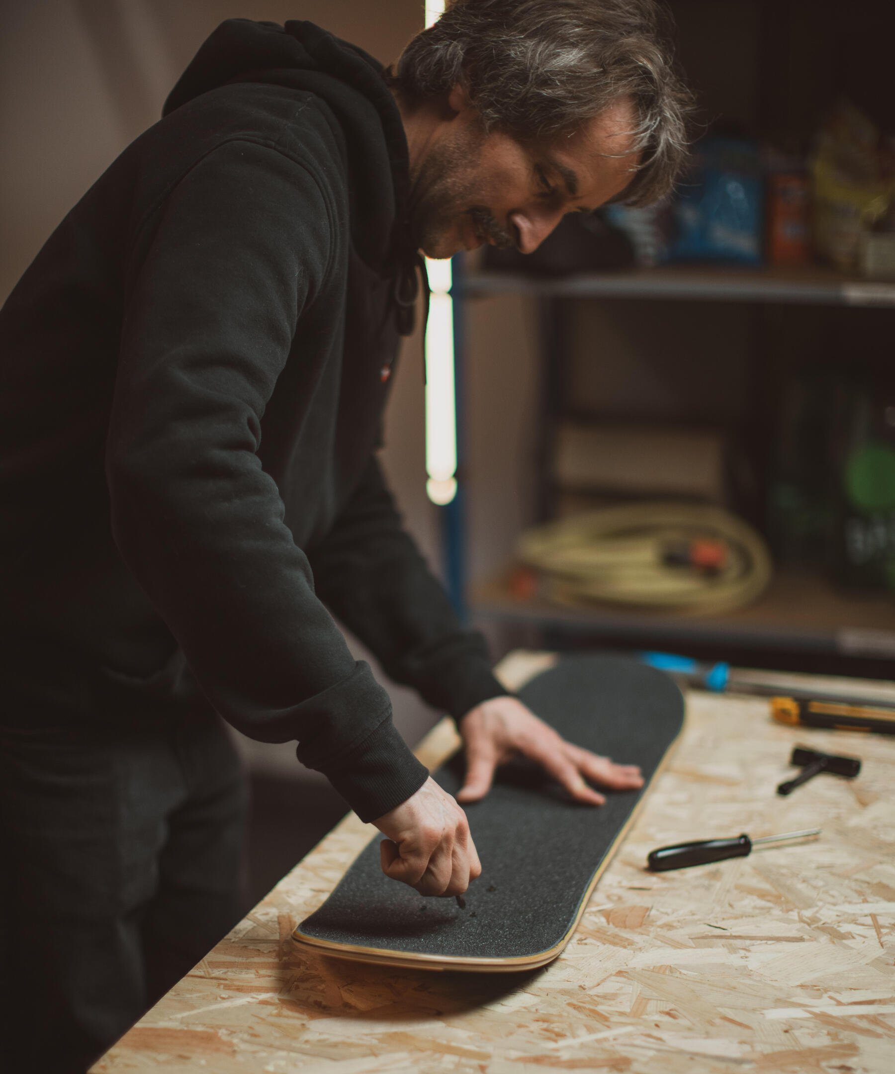 How do you clean and replace a skateboard grip?