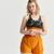 Brassière dos nageur avec coques maintien modéré Femme, Noir et ocre
