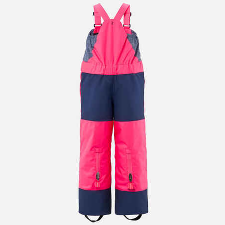 KIDS’ WARM AND WATERPROOF SKI DUNGAREES - 500 PNF - NEON PINK AND NAVY 