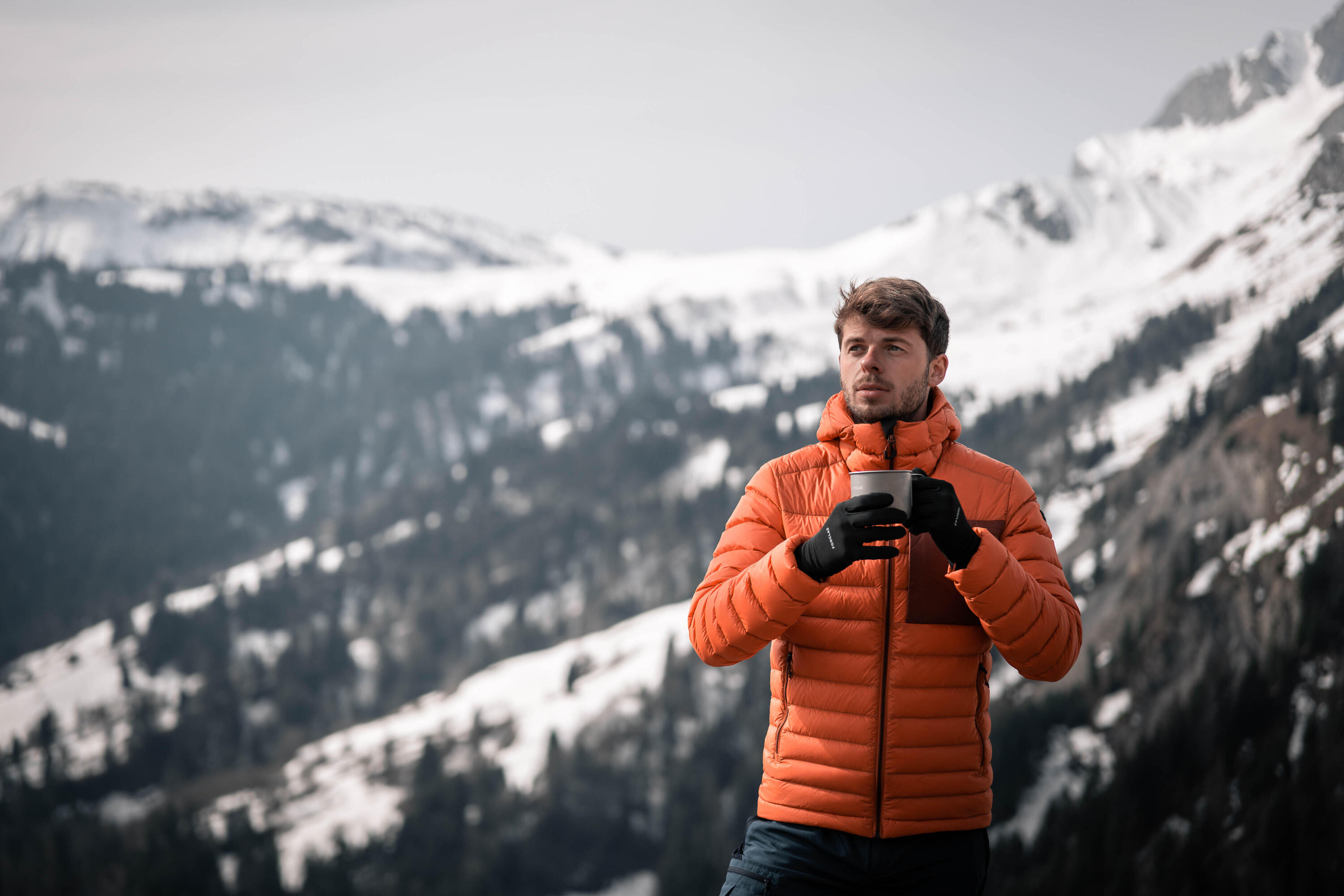 Daunenjacke Herren bis -10 °C Kapuze Trekking - MT500  11/12