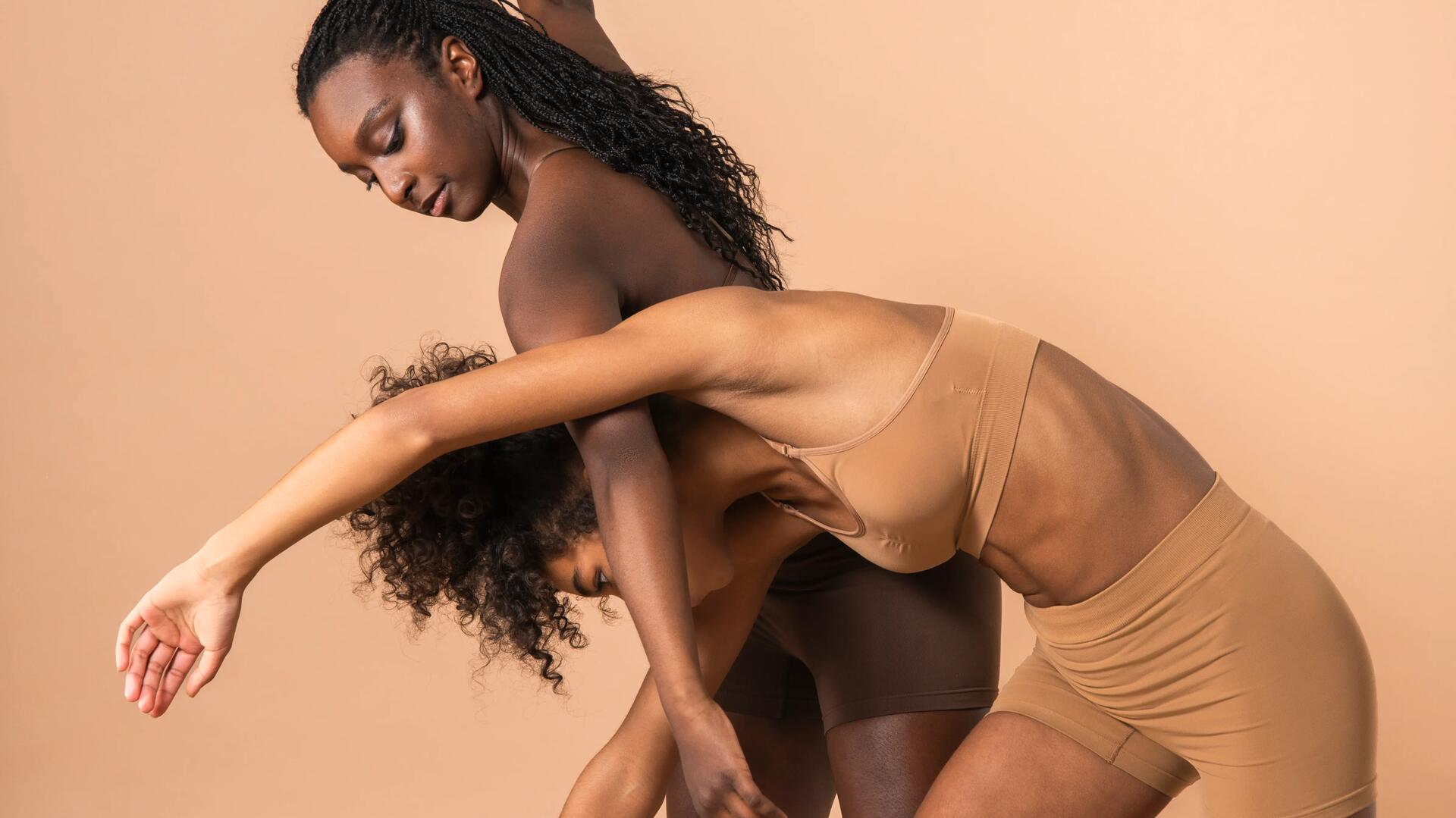Two women dancing with expressive movement