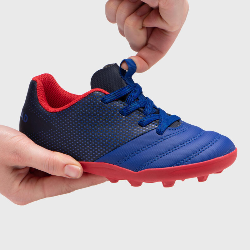 Chuteiras Rugby SKILL100 FG Atacadores Elásticos Piso Seco Criança Azul Vermelho