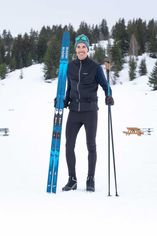 A person wearing cross-country ski gear