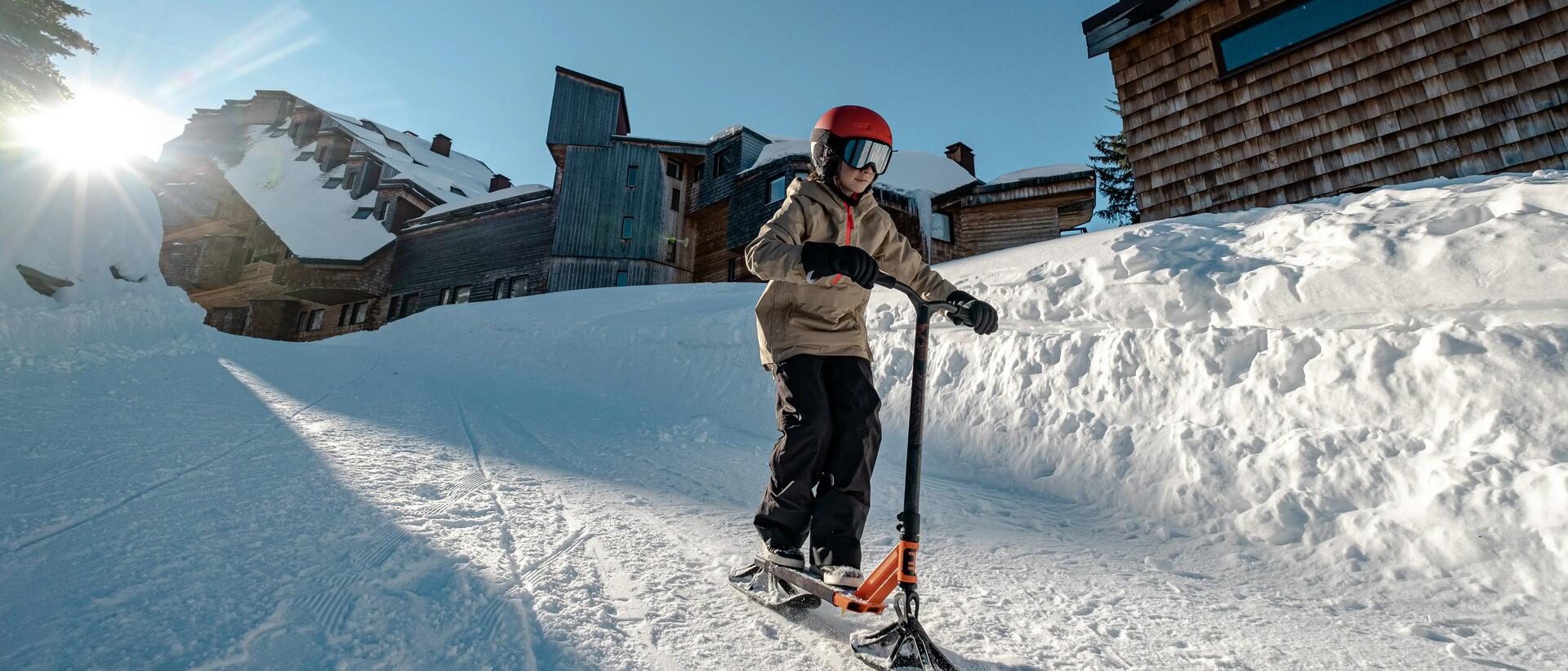 Kid using tray-style sledge