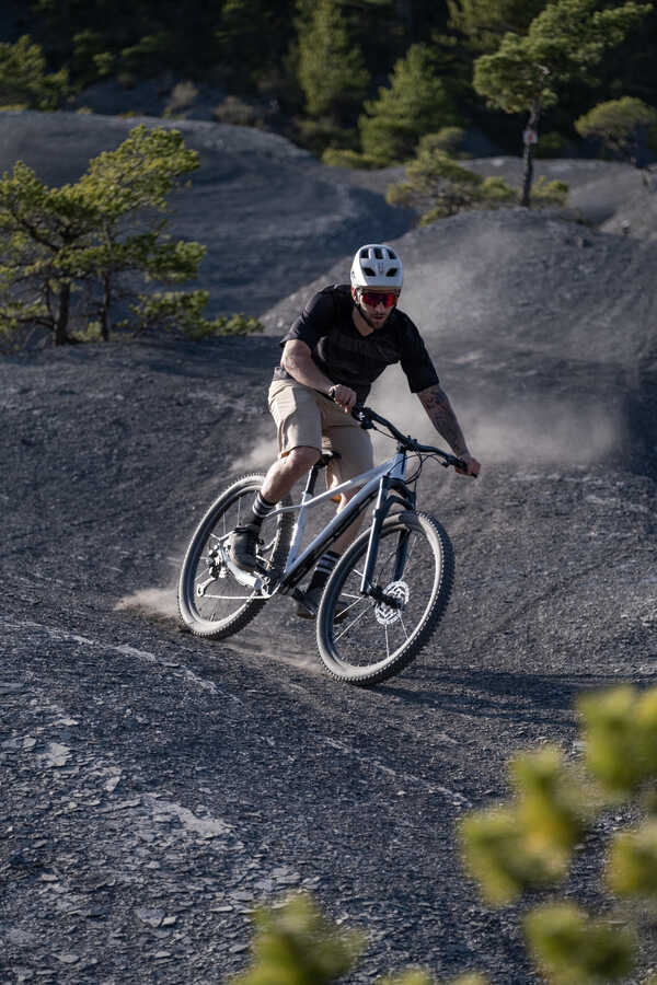 Person on mountain bike going down hill