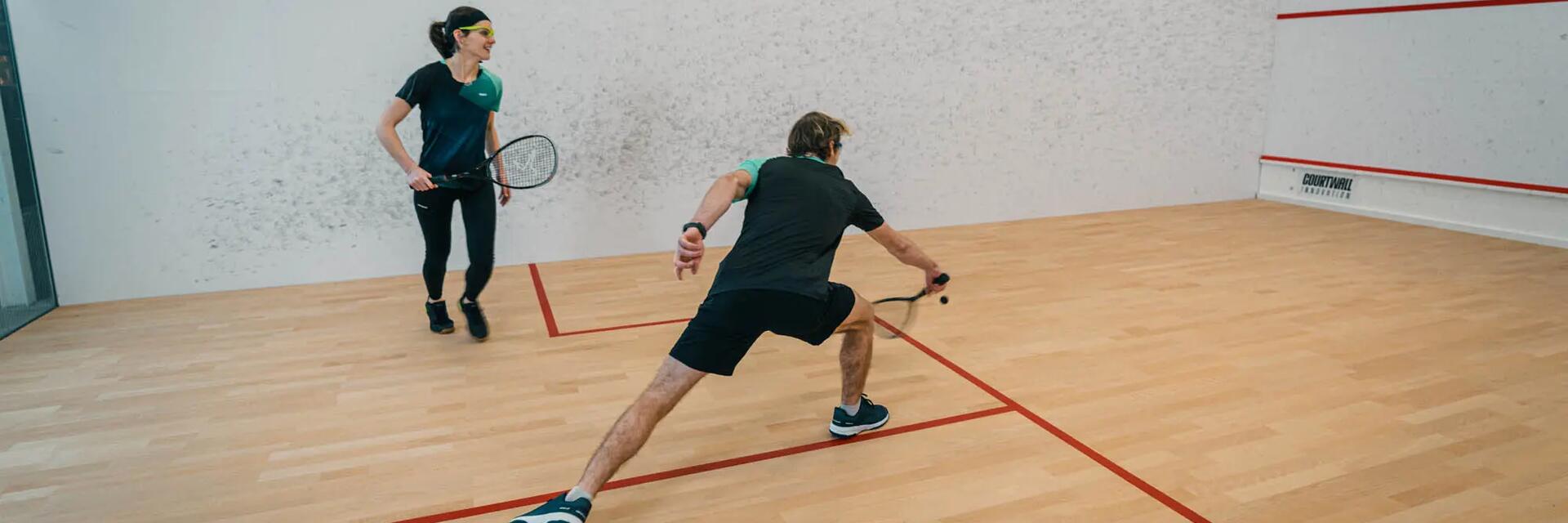 Dve ženy hrajúce squash hlavný banner