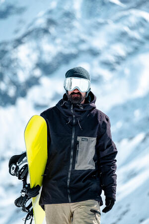homme avec snowboard jaune