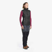Women’s synthetic sleeveless trekking padded jacket MT100 - Black