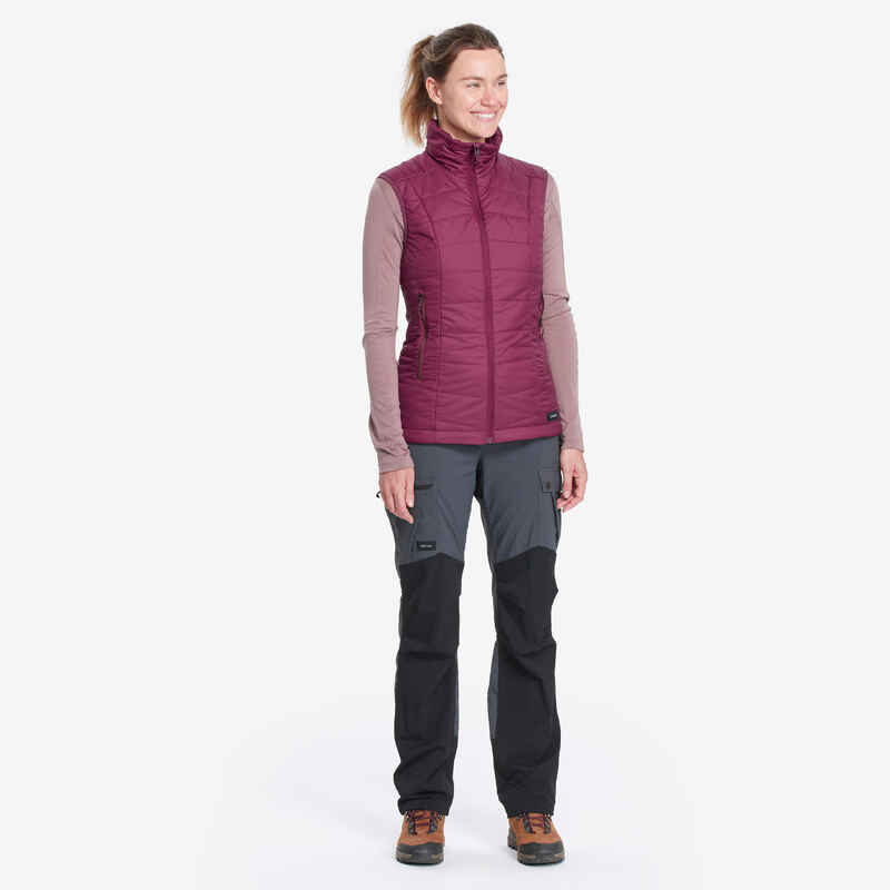 Women’s synthetic sleeveless trekking padded jacket MT100 - Purple