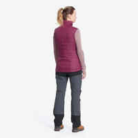 Women’s synthetic sleeveless trekking padded jacket MT100 - Purple