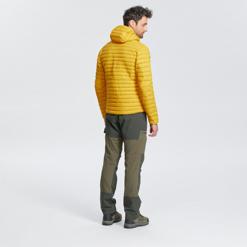 Piumino trekking uomo MT100 PIUMA giallo senape