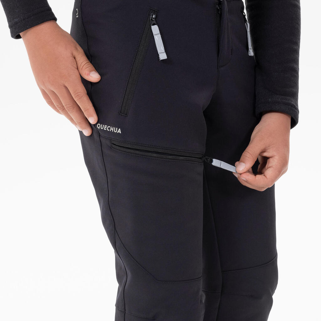 PANTALONE ZA PLANINARENJE SH500 DEČJE SOFTSHELL TOPLE - CRNE