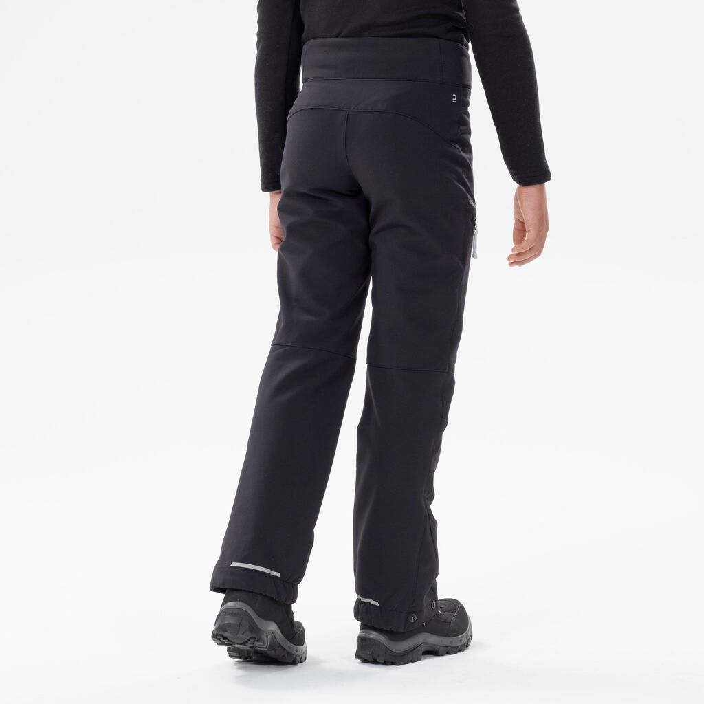 PANTALONE ZA PLANINARENJE SH500 DEČJE SOFTSHELL TOPLE - CRNE