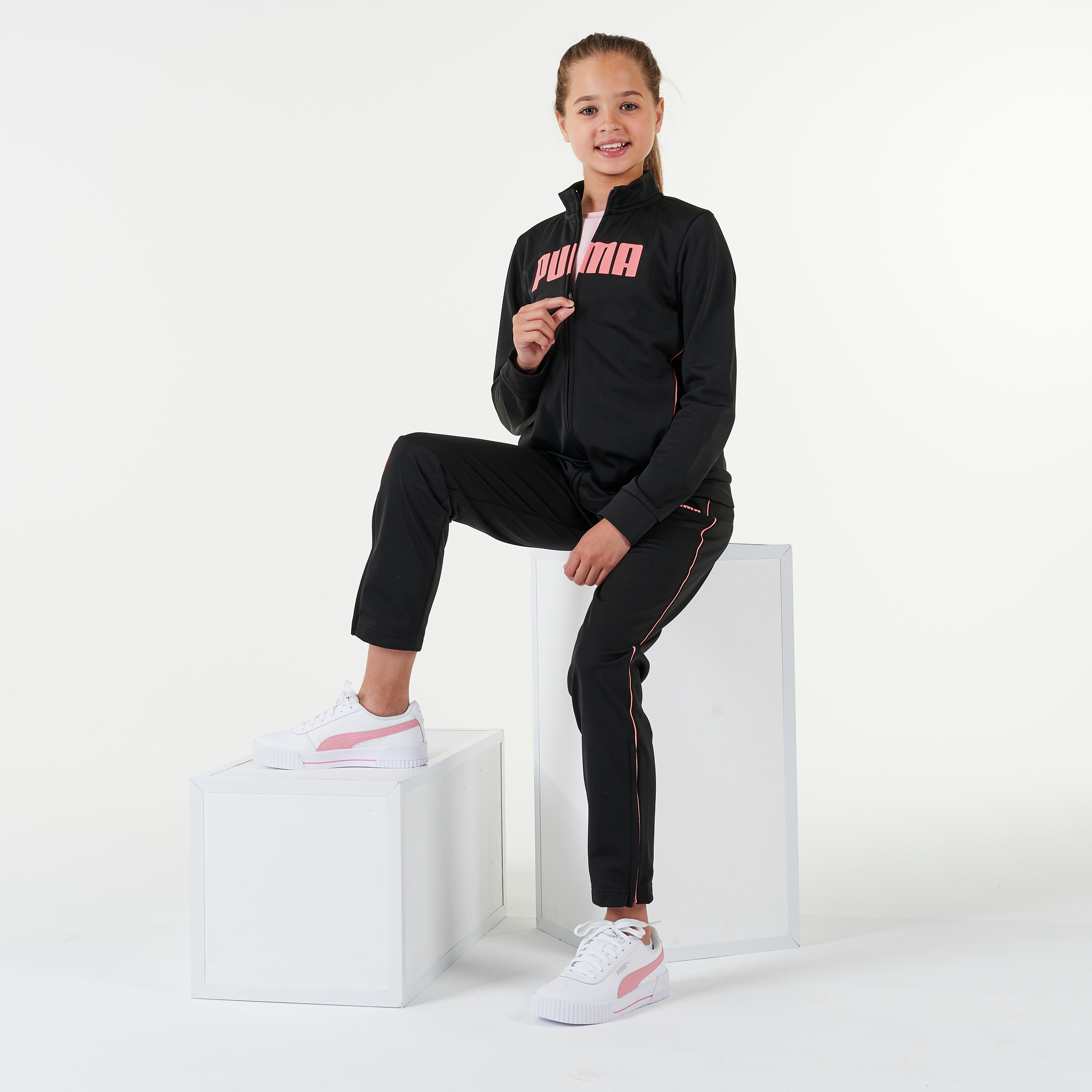 Synthetisch en ademend trainingspak voor meisjes zwart roze | PUMA |  Decathlon.nl