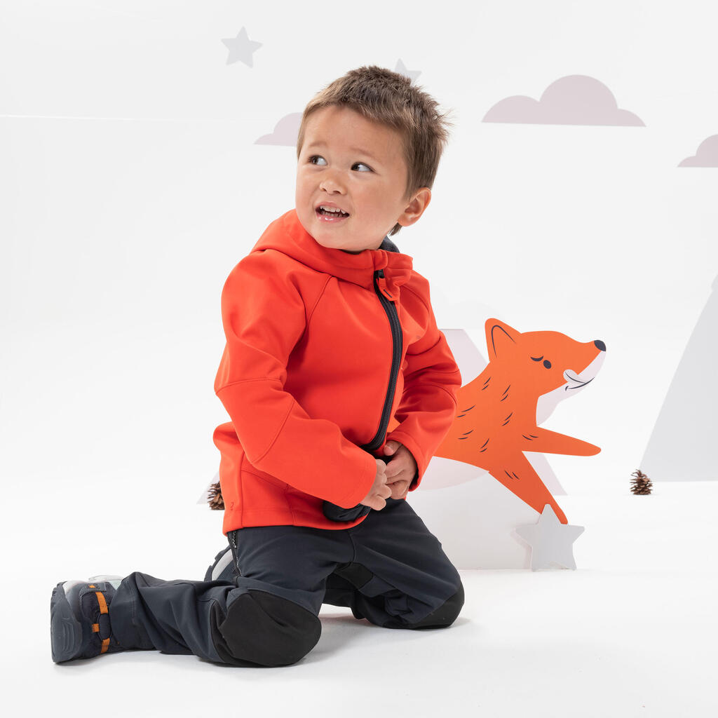 Detská turistická softshellová bunda MH550 2-6 rokov oranžová