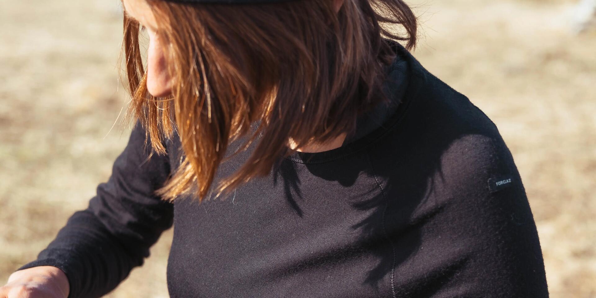 Woman wearing black base layer