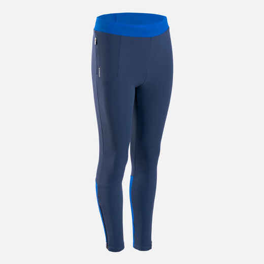 
      KIDS' RUNNING TIGHTS - KIPRUN DRY+ NAVY BLUE AND ELECTRIC BLUE
  