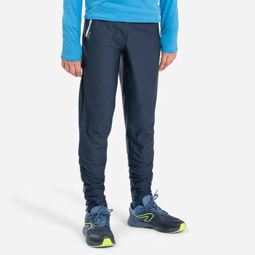 
      KIDS WARM RUNNING TROUSERS - KIPRUN WARM ZIP - NAVY BLUE GREY
  