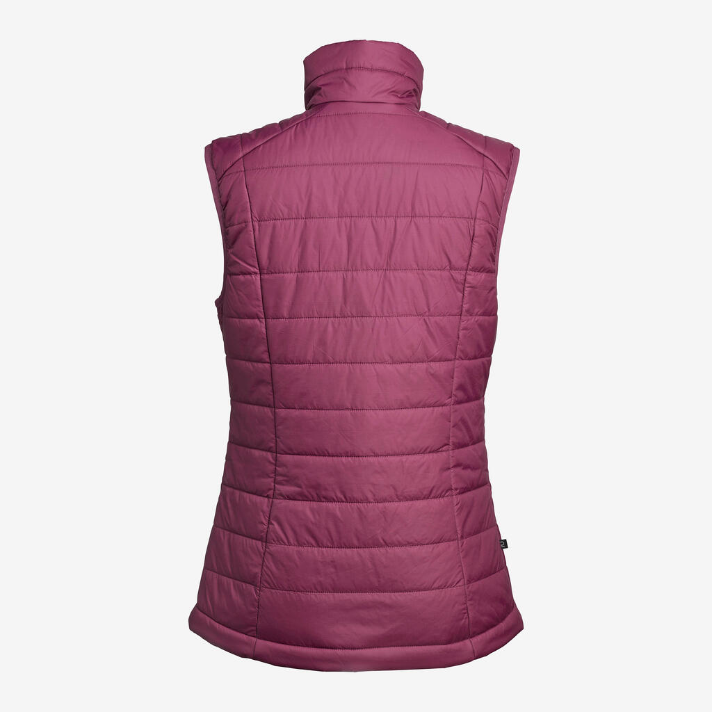 Women’s synthetic sleeveless trekking padded jacket MT100 - Purple