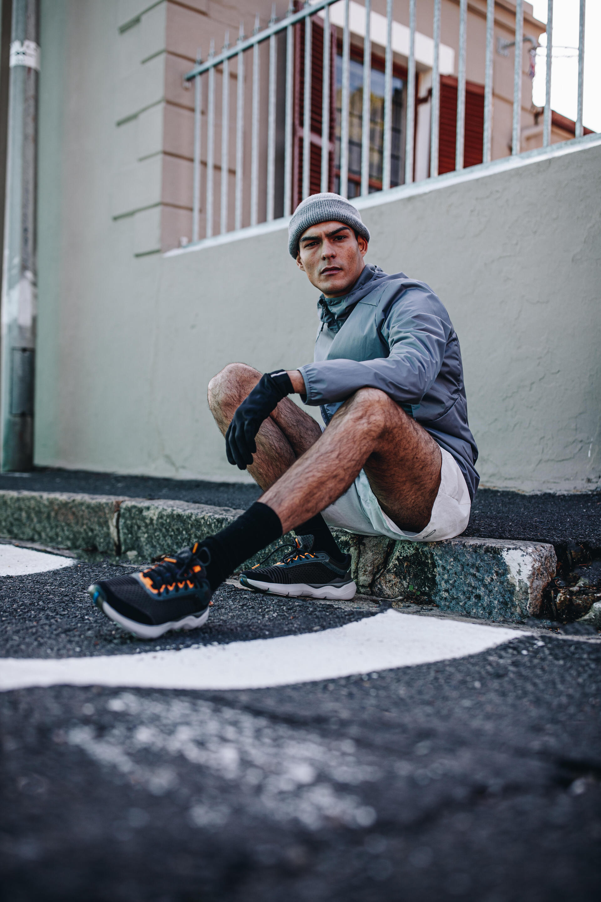 Grey Sport Shoes On Jeans Mens Legs Gray Sneakers Blue Jeans Stock