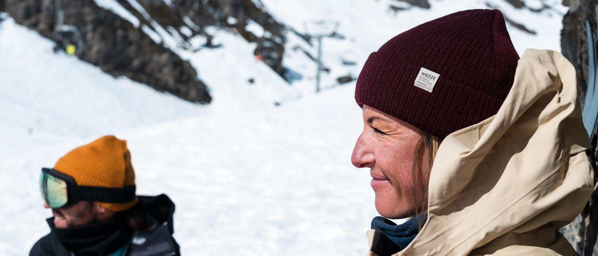 Man and woman wearing beanies