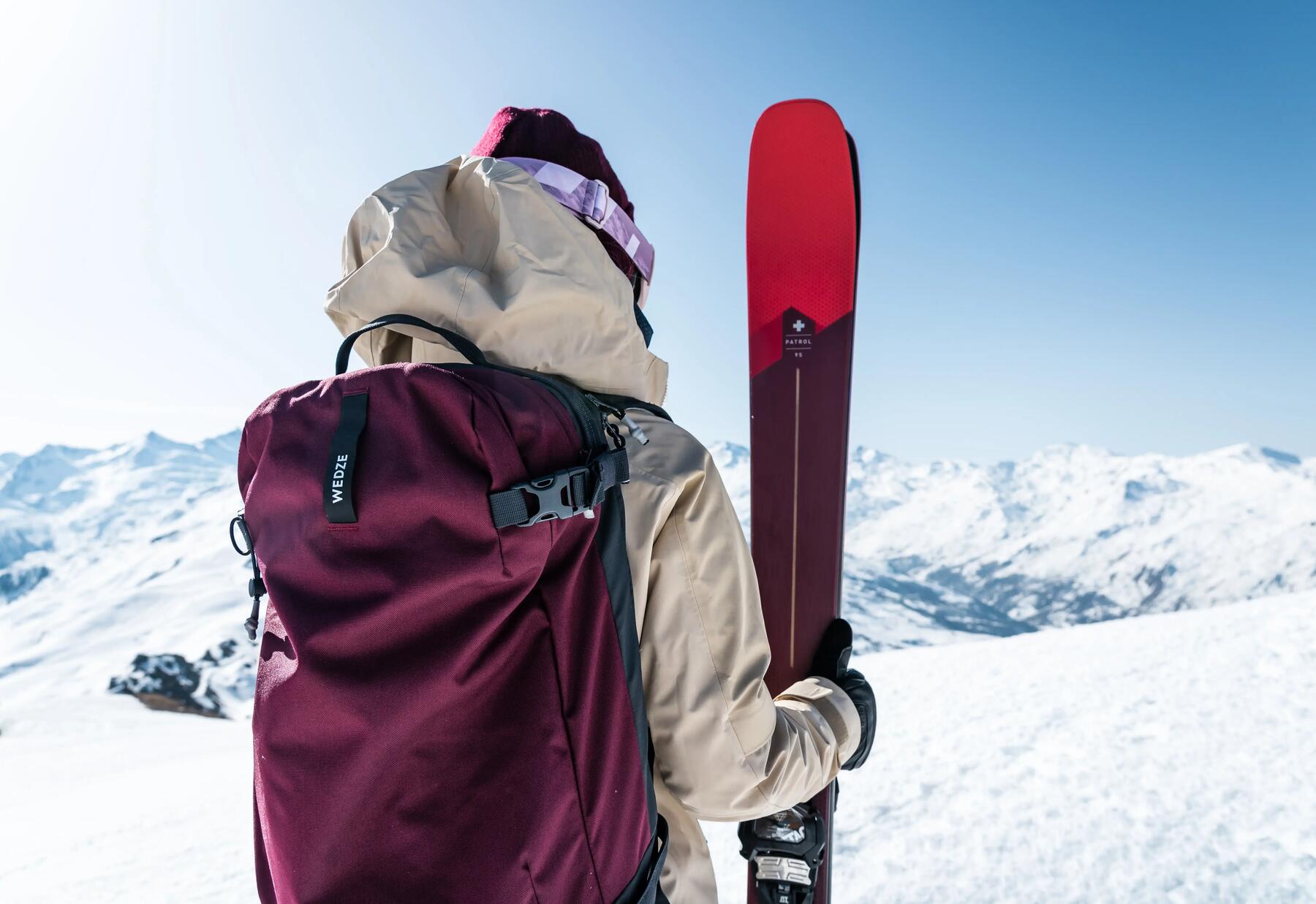 Man carrying skis