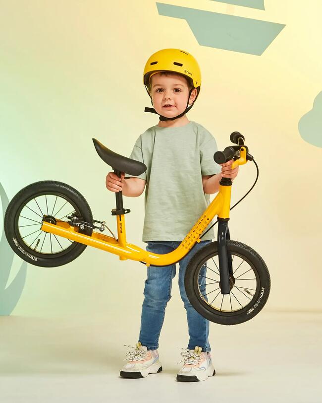 Child holding the bike