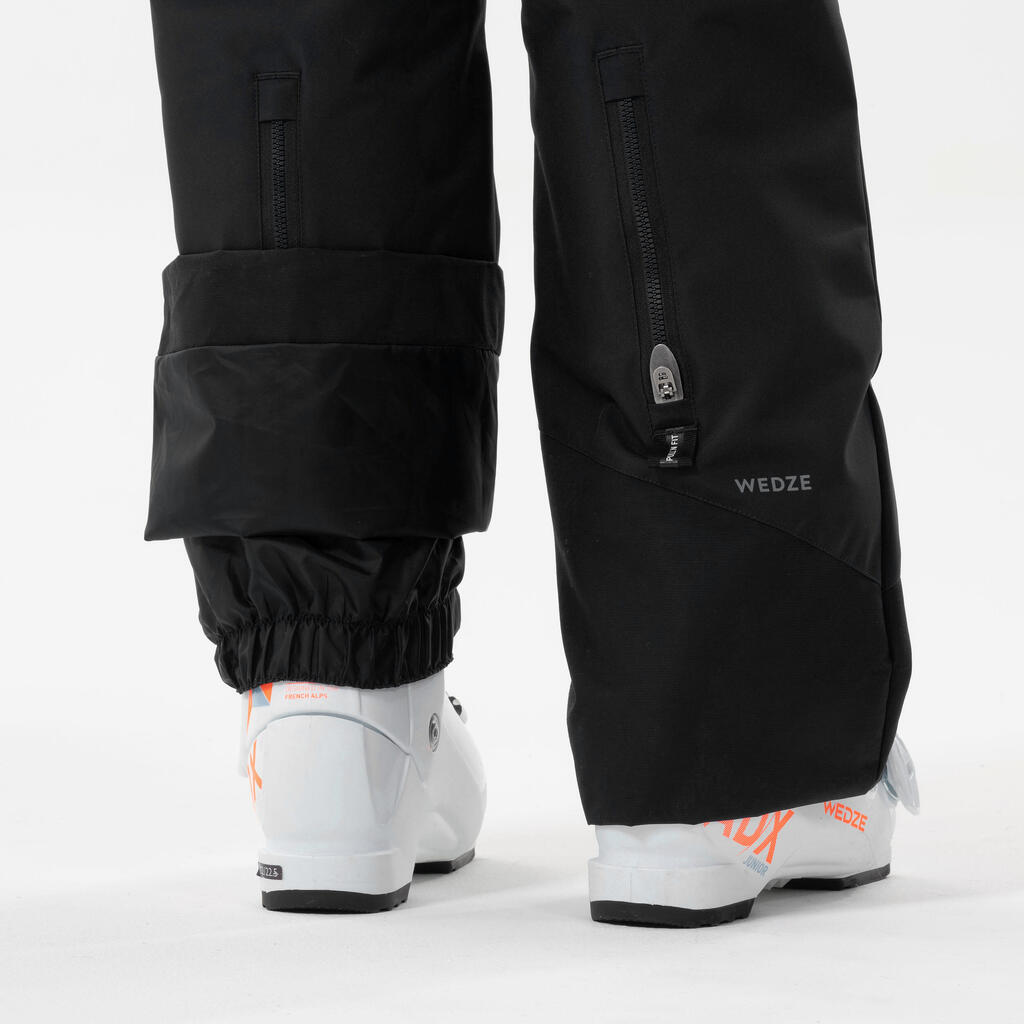 Detské lyžiarske nohavice PNF 500 nepremokavé s trakmi čierne