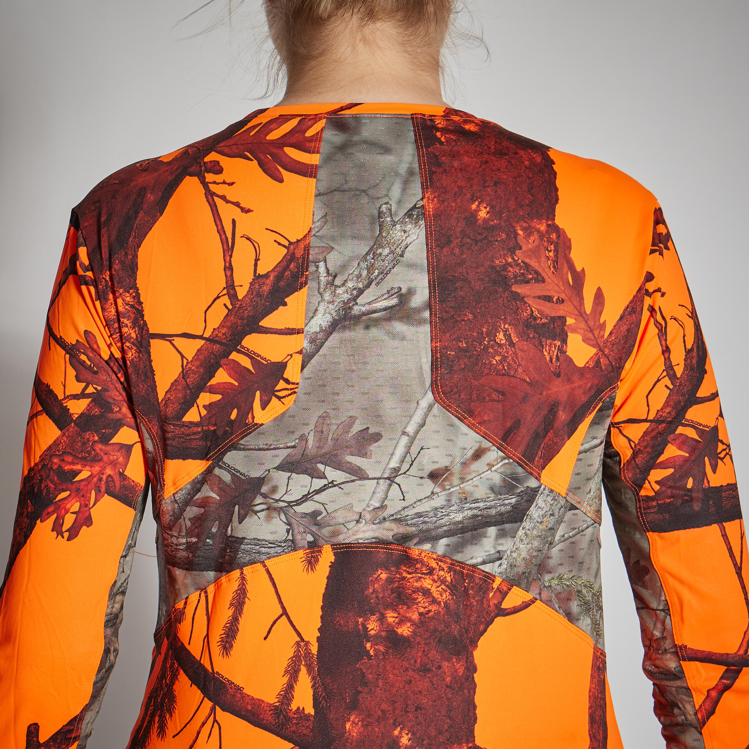 Jagdshirt langarm 500 Damen geräuscharm atmungsaktiv camouflage/orange  9/10