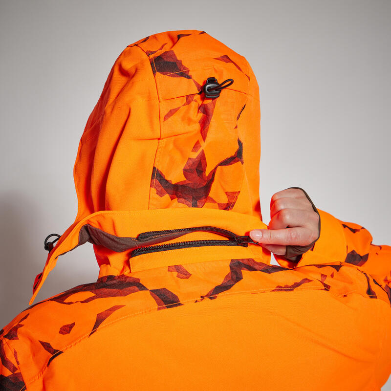 Stevige en waterdichte jachtjas voor dames Supertrack 500 fluo-oranje