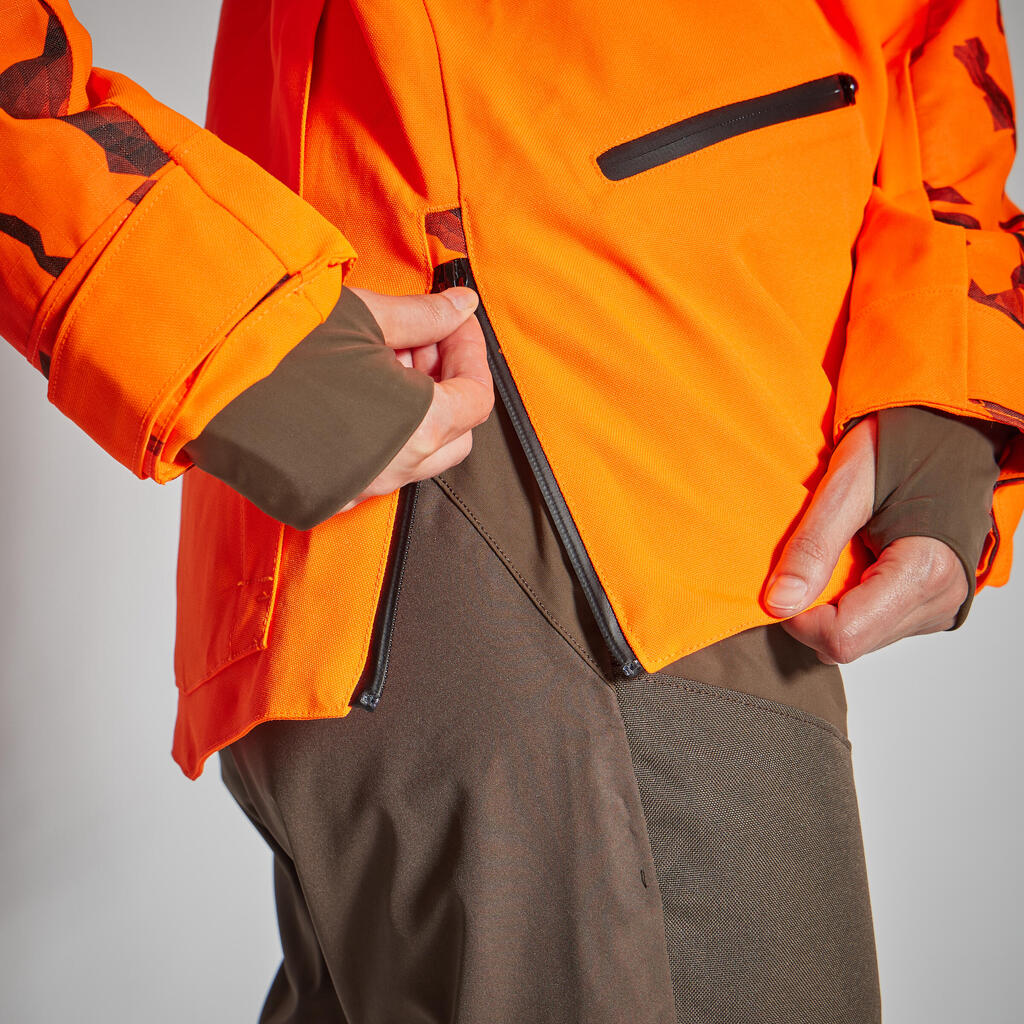 Dámska poľovnícka bunda Supertrack 500 nepremokavá odolná oranžová reflexná