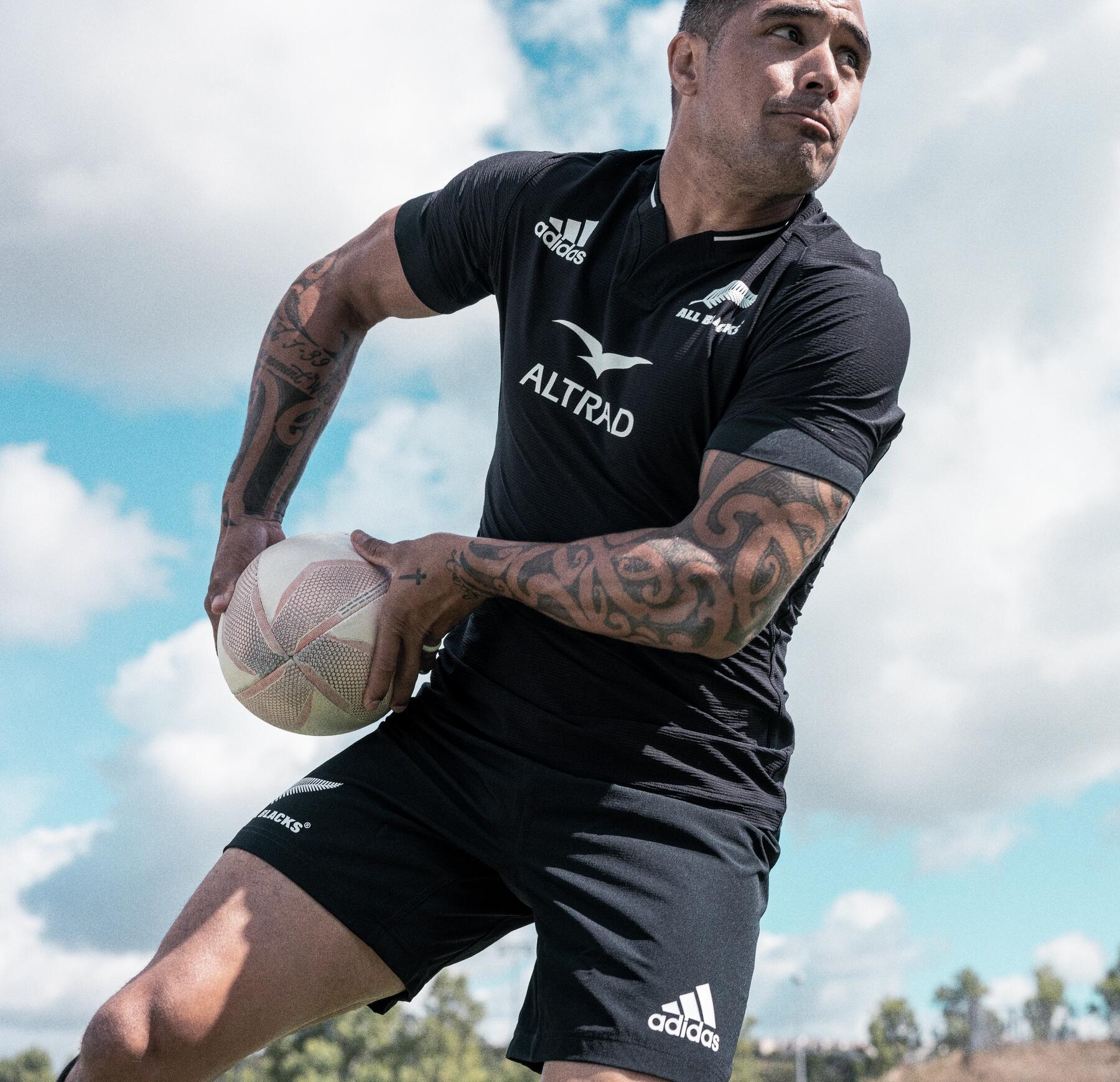hombre jugando a rugby