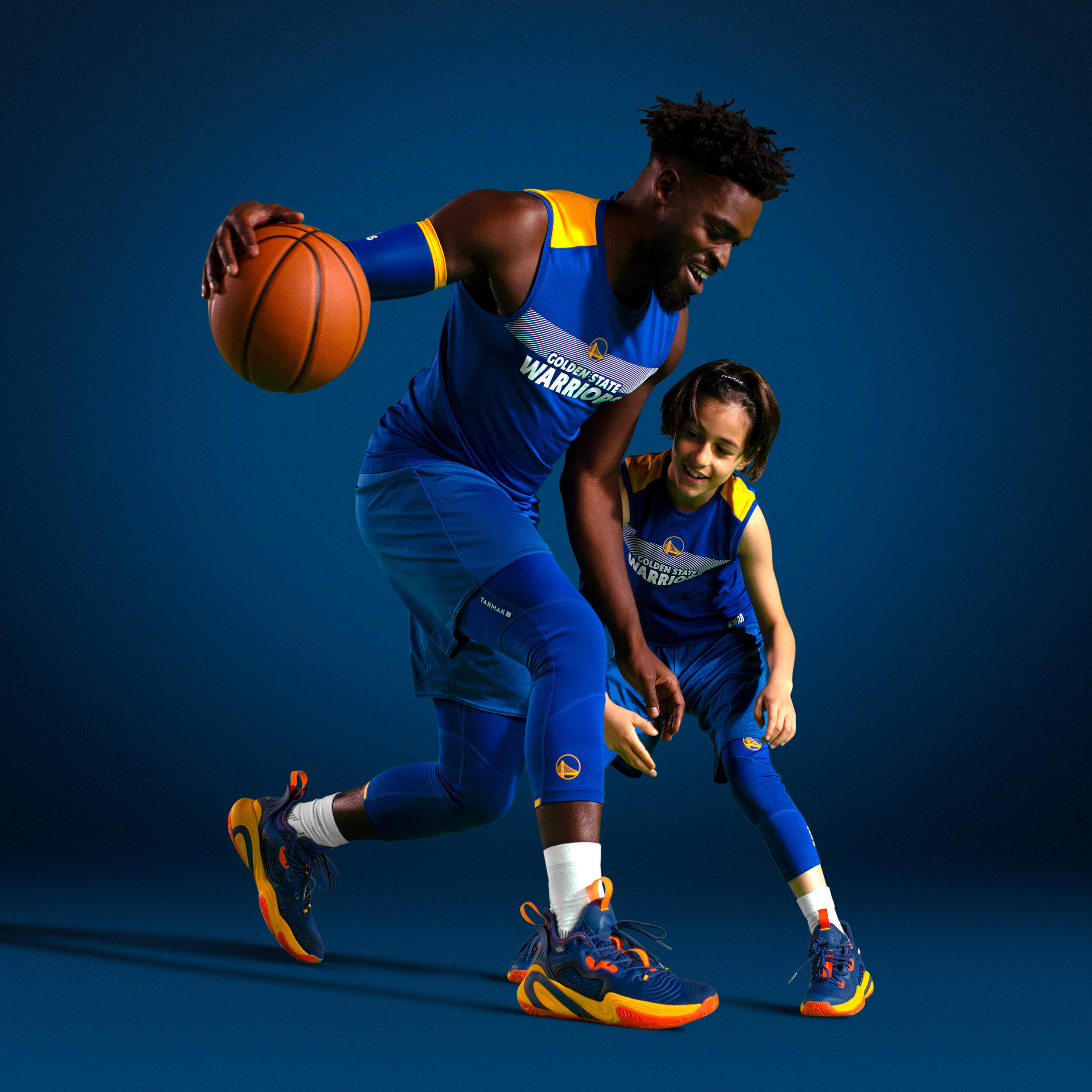 Pantaloni 3/4 da basket per bambini NBA Golden State Warriors - 500 blu