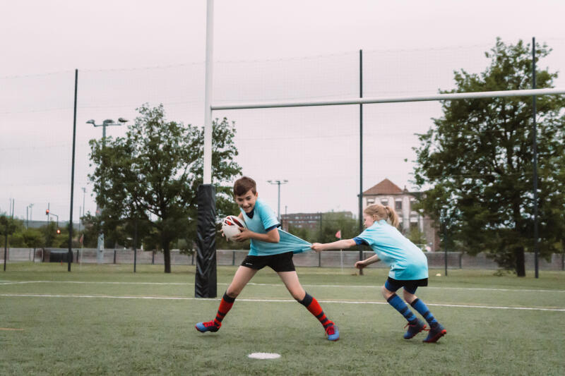 Buty do rugby dla dzieci Offload Skill 100 FG na suchą nawierzchnię