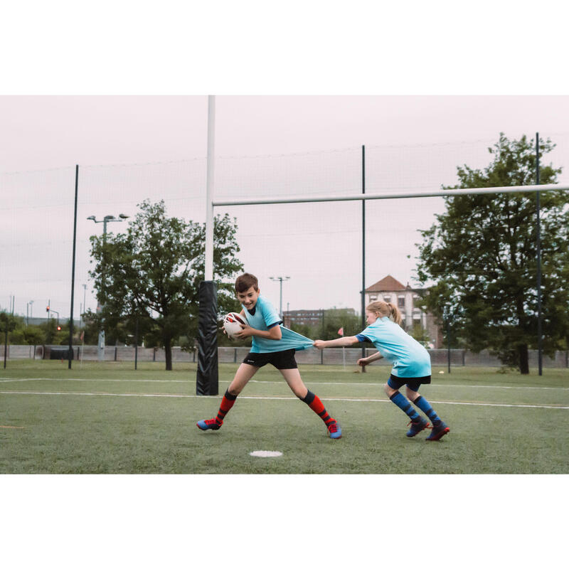 Botas de Rugby Niños terreno seco Offload SKILL 100 FG azul rojo