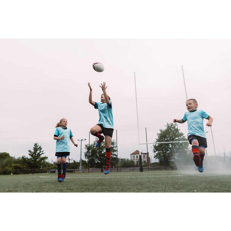 Botas de Rugby Niños terreno seco Offload SKILL 100 FG azul rojo